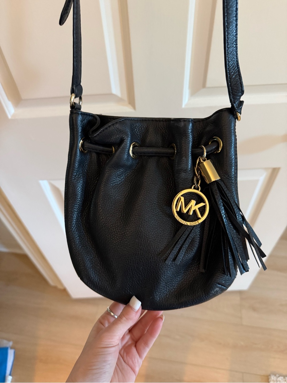 Michael Kors Black Leather Drawstring Crossbody Bag with Tassel